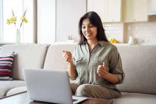 Woman on call with laptop