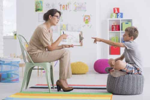 Therapist in one to one session with child