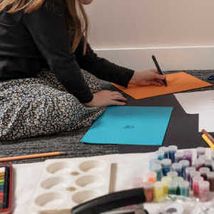Child drawing as part of a play therapy session