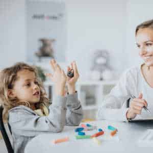 Child in sensory session with therapist