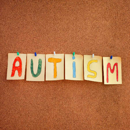 Autism - word spelt out on cork board