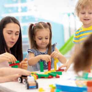 Schoolchildren in group play therapy session