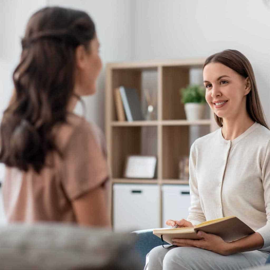 two women having a one to one meeting
