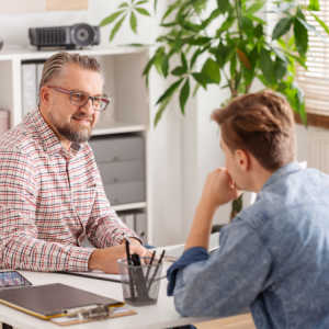 two men in consultation meeting