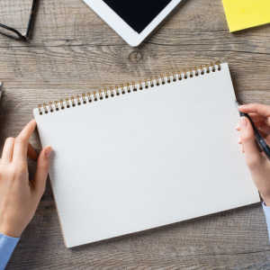 helicopter view of blank writing pad