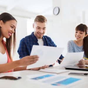 Office workers engaged in active discussion