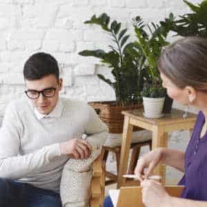 male client with occupational therapist